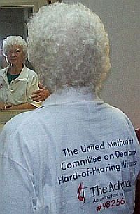 Barbara Reynolds with shirt printed with UMCDHM Advance number