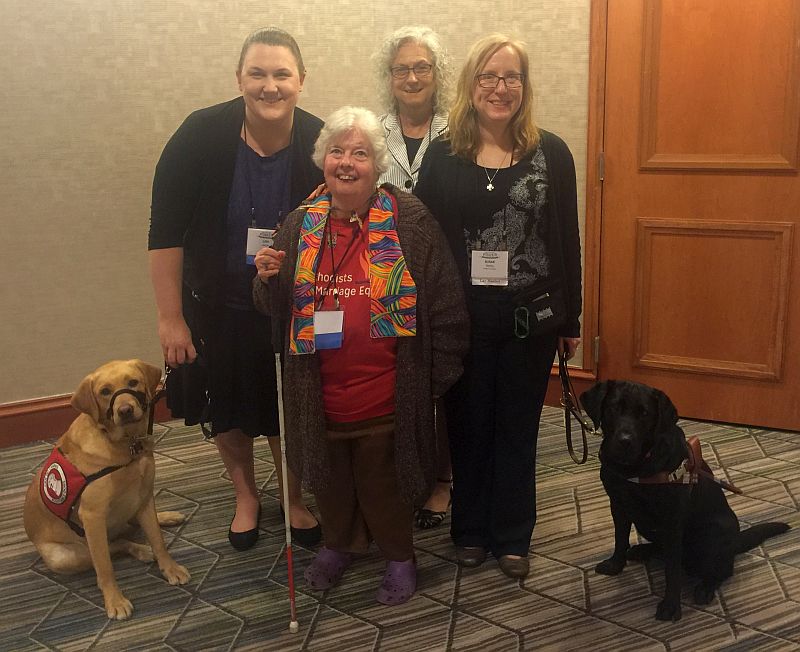 retired clergywoman who is blind and uses a white cane; 
a tall deaf/ hard of hearing, tall clergywoman with her hearing service dog, who was just ordained a full elder today; and a Yale Seminary student who is 
in the ordination process for full elder with her service dog for blind/visually impaired people.