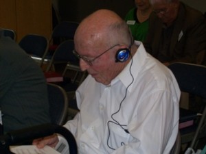 photo of man using hearing device